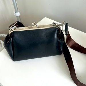 Kissed lock bag with shoulder/cross body strap